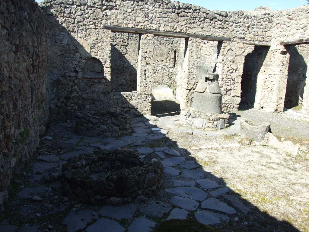 V.3.8 Pompeii. March 2009. Looking north across atrium bakery area.