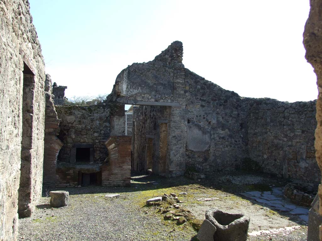 V.3.8 Pompeii. March 2009. Looking south across bakery area from east side.