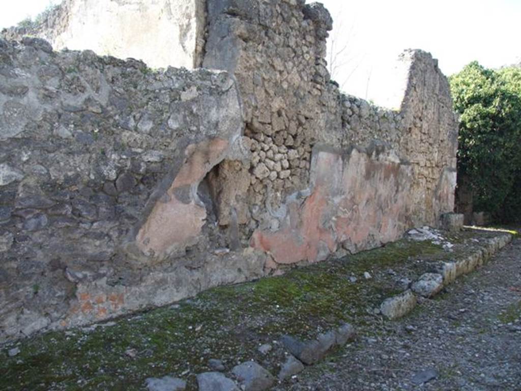 V.3.11 Pompeii. March 2009. Front street wall, with painted plaster on west side of Vicolo di Lucrezio Frontone. According to Cooley, the following graffito was found -
I beg you to elect Cn. Helvius Sabinus and M. Samellius Modestus aediles, worthy of public office. [CIL IV 6616]
See Cooley, A. and M.G.L., 2004. Pompeii : A Sourcebook. London : Routledge. (p.124, F70)
According to Epigraphik-Datenbank Clauss/Slaby (See www.manfredclauss.de) it read -
Cn(aeum) Helvium Sabinum
M(arcum) Samellium Modestum
aed(iles) d(ignos) r(ei) p(ublicae) o(ro) v(os) f(aciatis)    [CIL IV 6616]

