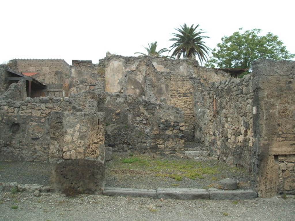 V.4.5 Pompeii, doorway on right. May 2005. Looking north to entrance on north side of Via di Nola. 