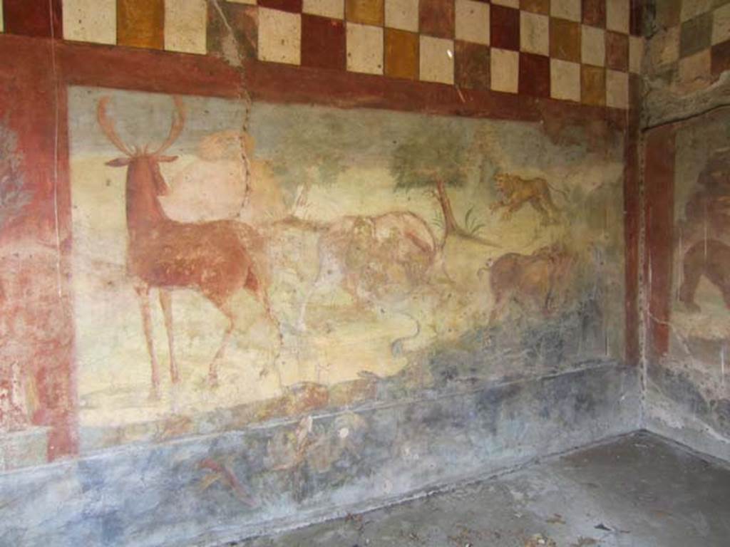 V.4.a Pompeii. March 2012. Hunting fresco with life-size animals on north wall of garden area. Photo courtesy of Marina Fuxa.
