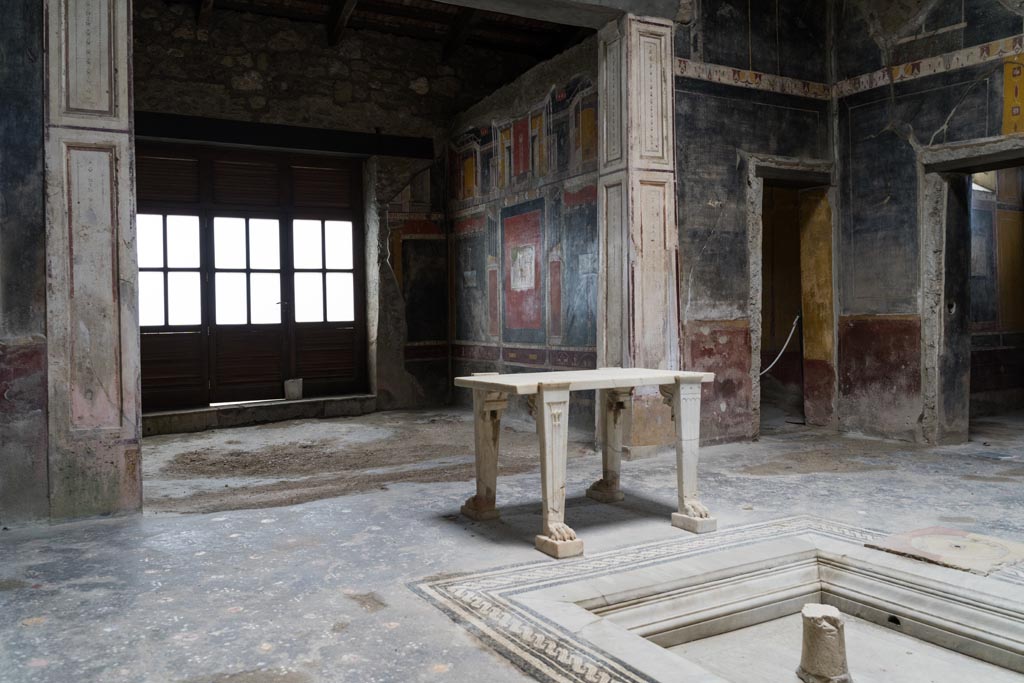 V.4.a Pompeii. March 2023. Looking towards south-east corner of atrium. Photo courtesy of Johannes Eber.