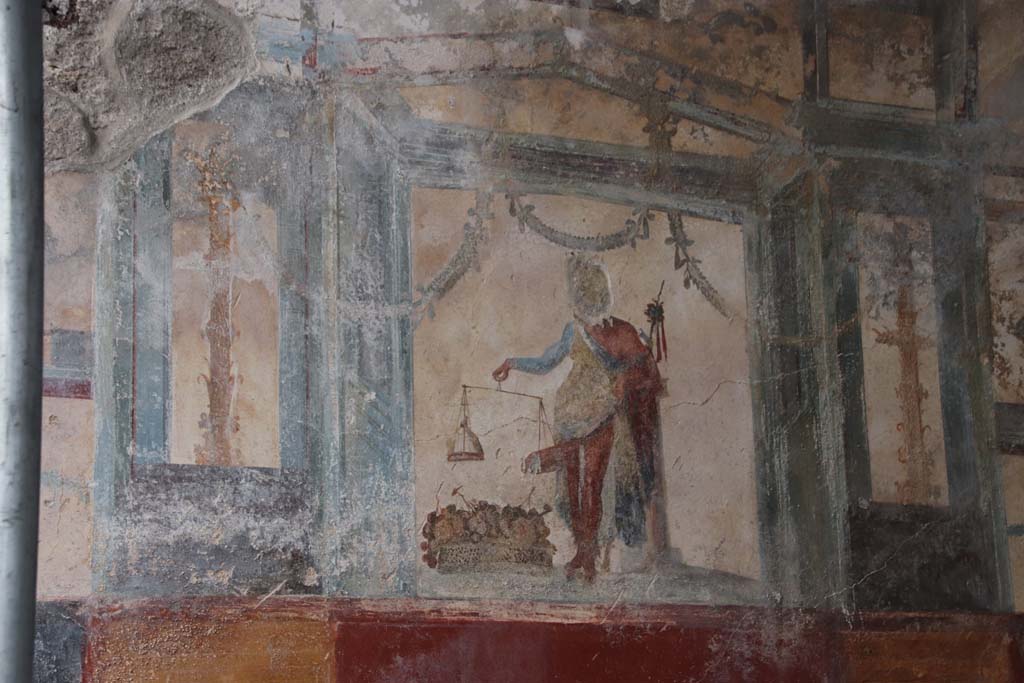 V.6.12 Pompeii. October 2020. Detail of painted upper north wall of entrance fauces/corridor. Photo courtesy of Klaus Heese.