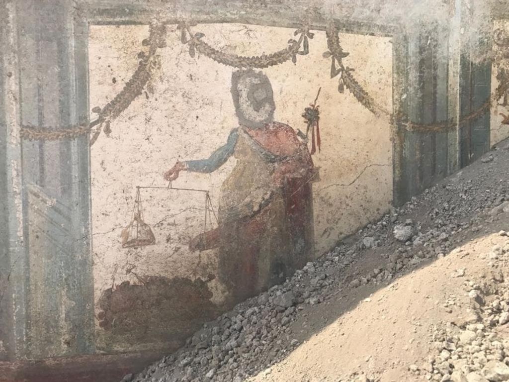 V.6.12 Pompeii. August 2018. Painting of Priapus weighing his member, found in fauces.
Dipinto di Priapo che pesa il suo membro, trovato in fauces.
Photograph © Parco Archeologico di Pompei.
