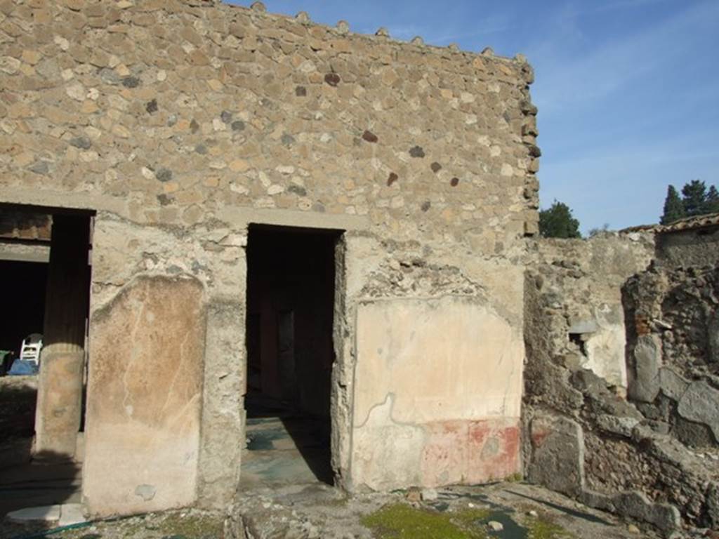 VI.1.7 House of the Vestals.  Room 12 doorway leading to room 13, the peristyle.