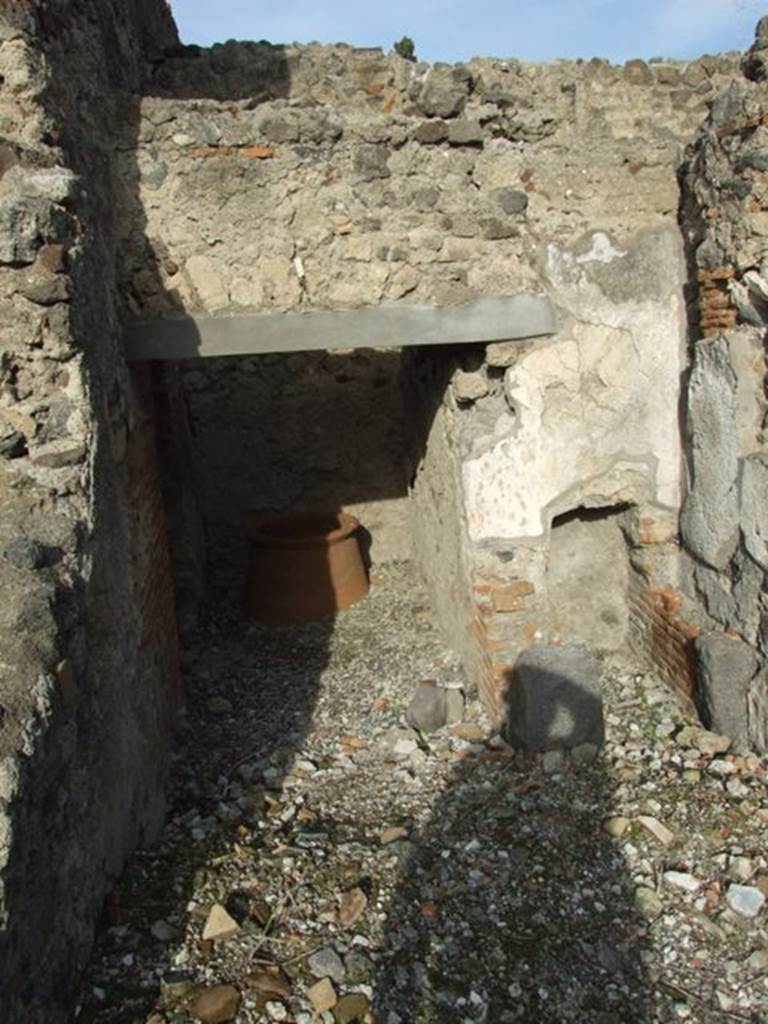 VI.1.7 Pompeii. December 2007. Room 24, baths services area, looking north from room 28.
? area of steps to upper floor, possibly the ones bombed in 1943?
