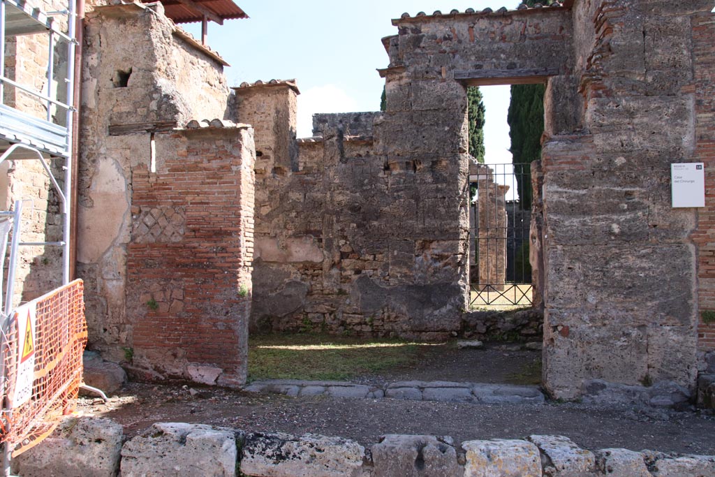 VI.1.9 Pompeii. May 2024. Looking east to entrance doorway to shop. Photo courtesy of Klaus Heese.