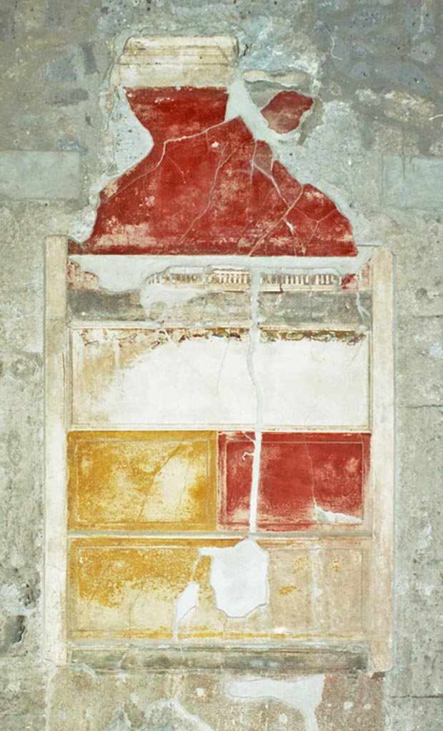 VI.2.4 Pompeii. October 2001. 
Detail of wall decoration on north side of atrium, between doorways to the anteroom of the winter triclinium, and a cubiculum. 
Photo courtesy of Peter Woods.
