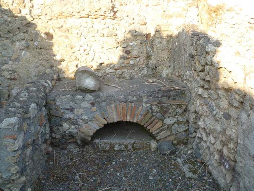 VI.5.9 Pompeii. May 2011. Hearth in kitchen area.