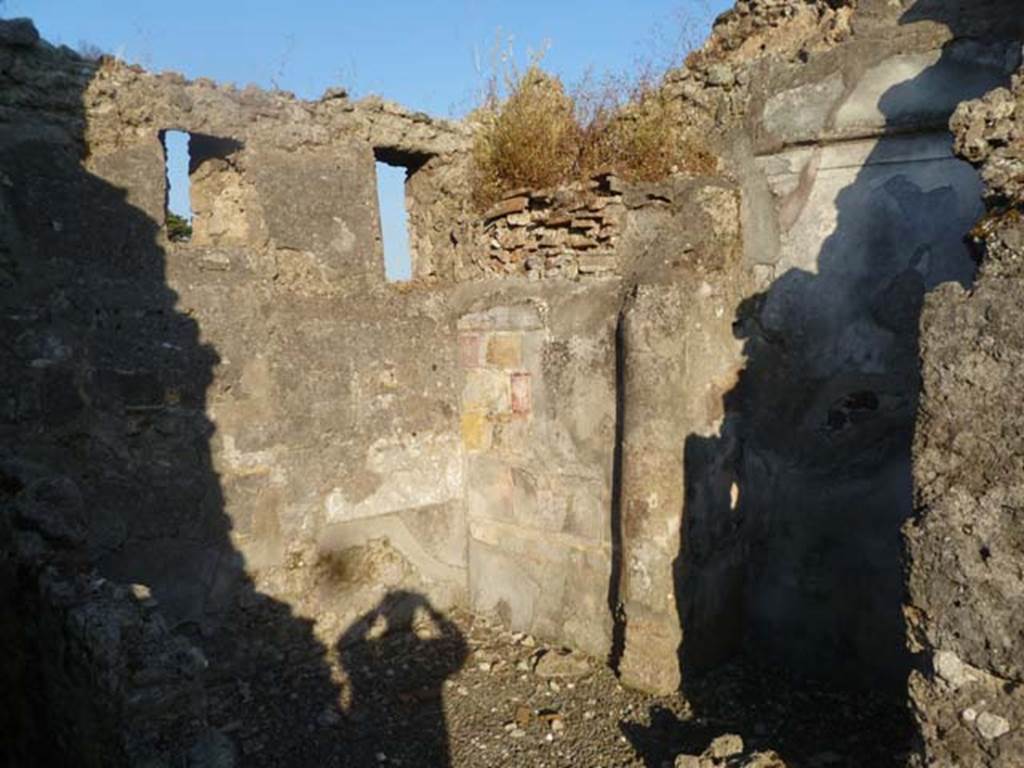 VI.5.19 Pompeii. May 2011. Room in south-east corner of atrium.
According to PPM, this room was a cubiculum with traces of floor and wall decorations remaining in the Ist Style.
See Carratelli, G. P., 1990-2003. Pompei: Pitture e Mosaici, IV. Roma: Istituto della enciclopedia italiana, (p.355)
