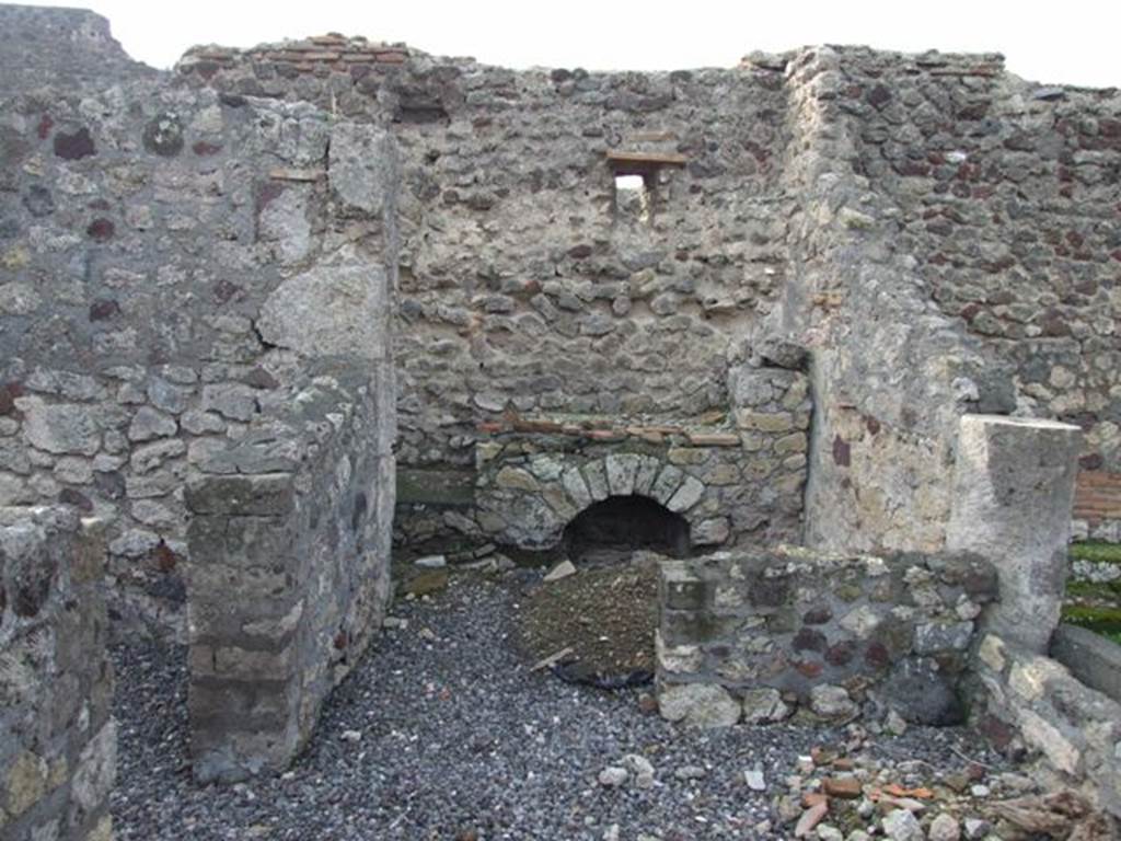 VI.5.10 Pompeii. December 2007. Room 4, looking west along south portico to kitchen area.