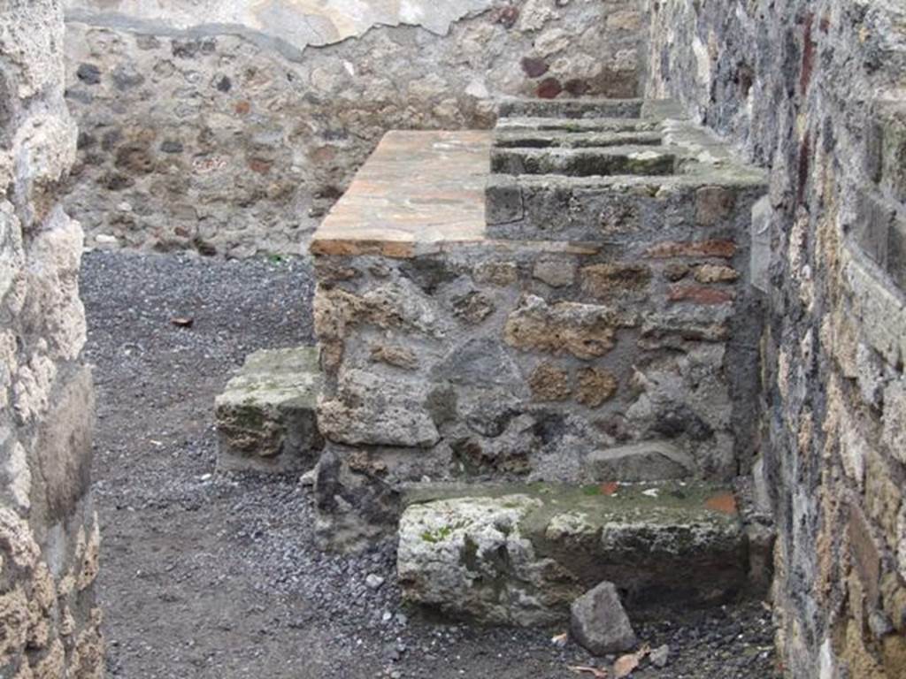 VI.6.1 Pompeii. December 2007. Room 16, hearth in kitchen area in north-west corner of peristyle.