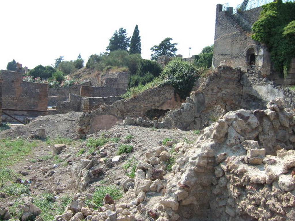 VI.9.1 Pompeii. September 2005. Looking west along north side of VI.9.1, from site of cubiculum 7.