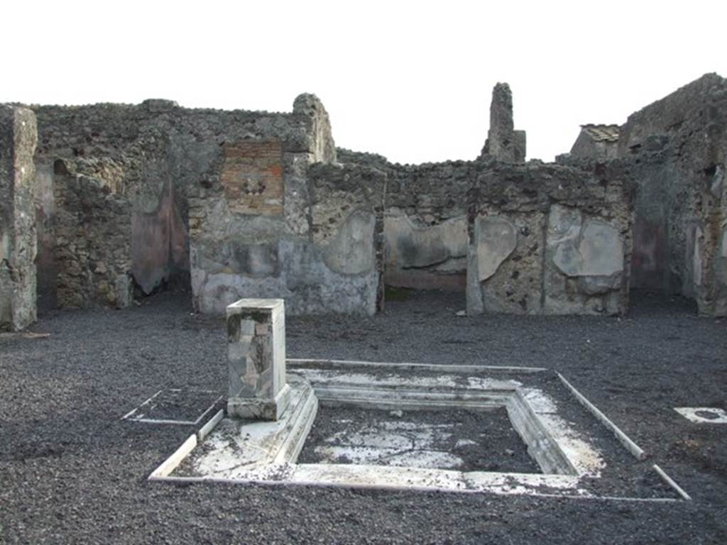 VI.9.2 Pompeii. December 2007. Room 2, atrium and impluvium 3, looking south at doorways to three cubicula, 14, 13 and 12.