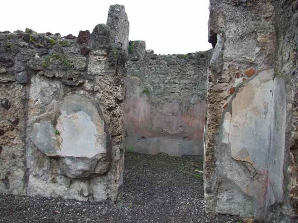 VI.9.2 Pompeii. May 2010. Doorway to room 12, cubiculum, from south side of atrium.