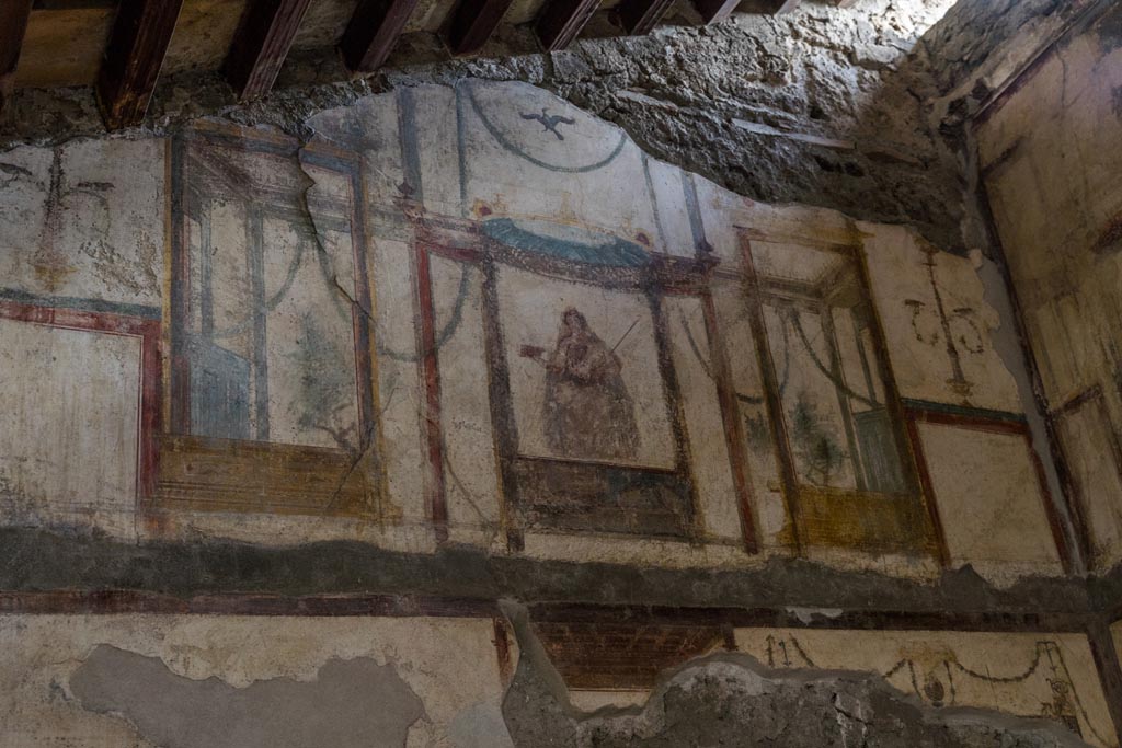 VI.9.6 Pompeii. January 2023. Room 16, looking towards painted figure on upper south wall. Photo courtesy of Johannes Eber.