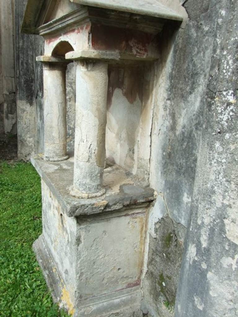 VI.9.6 Pompeii. March 2009. Room 17, south side of aedicula lararium against east wall of garden area.    