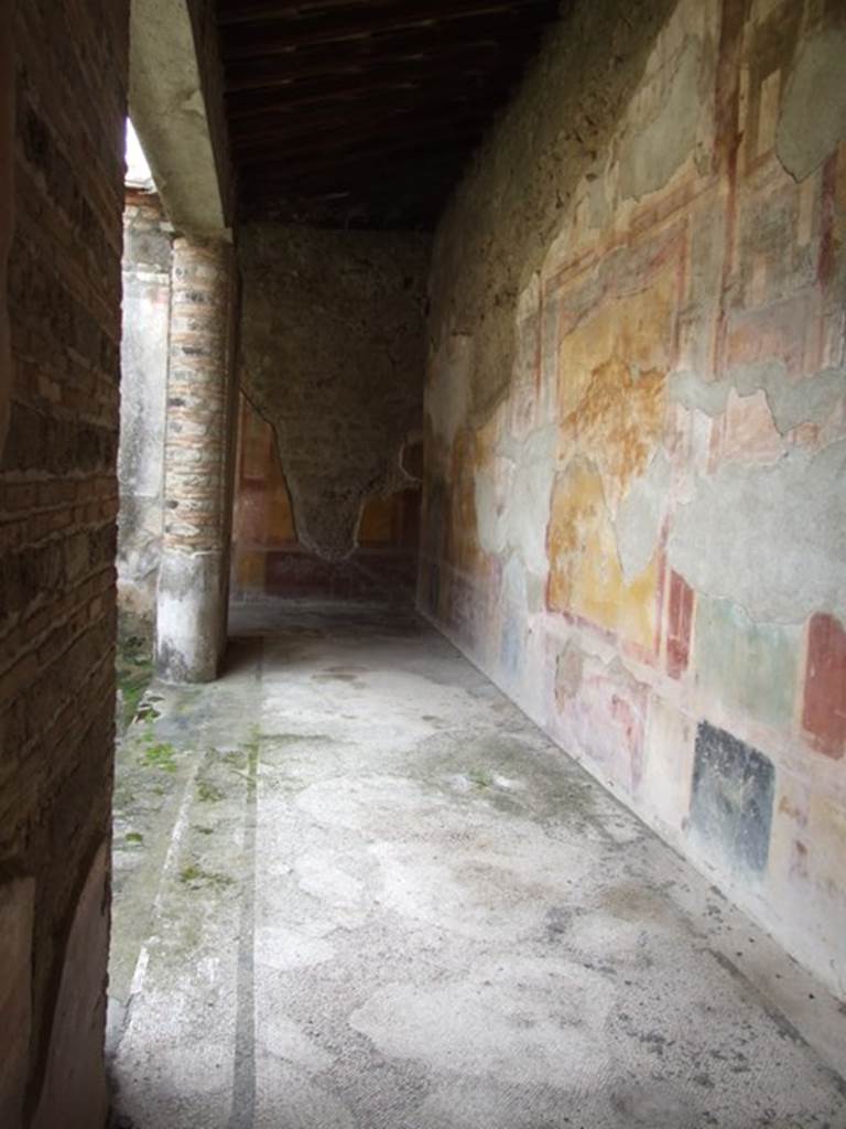 VI.9.6 Pompeii. March 2009. Room 6, looking south along west wall of peristyle.