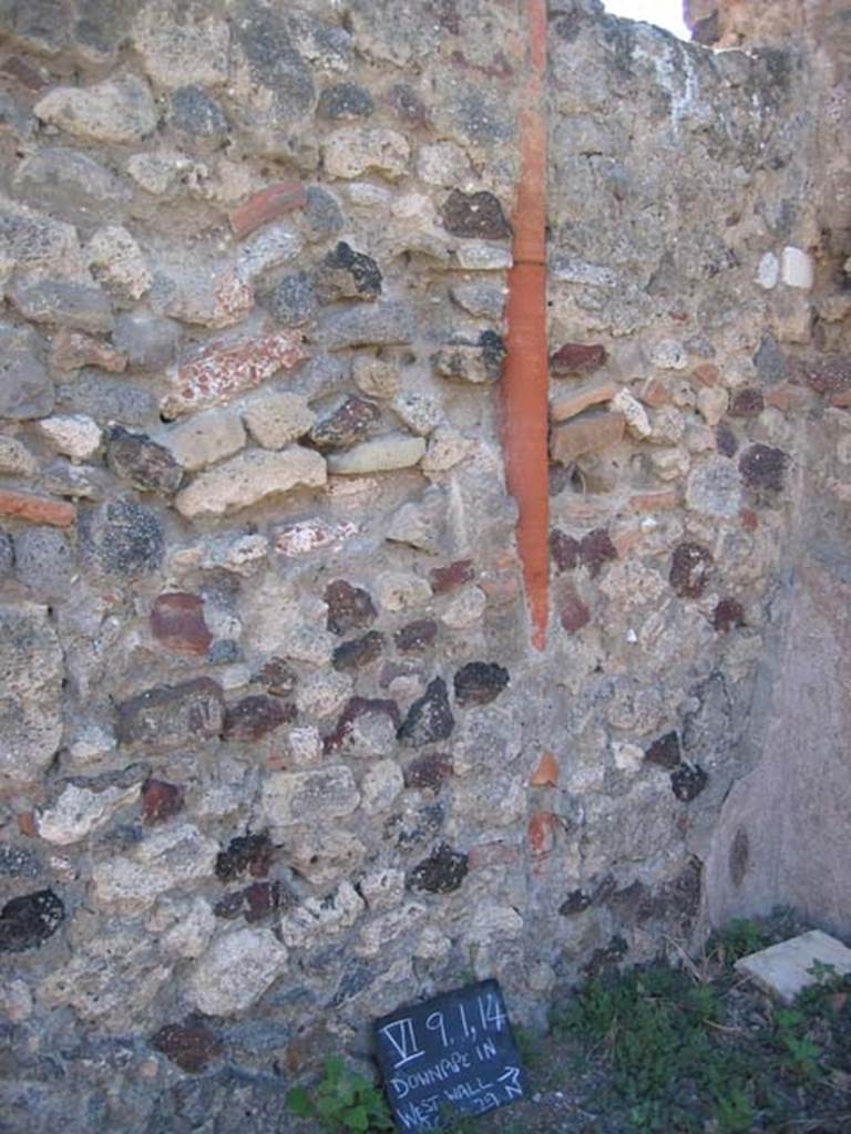 VI.9.14 Pompeii. July 2008. Downpipe in west wall. Photo courtesy of Barry Hobson.