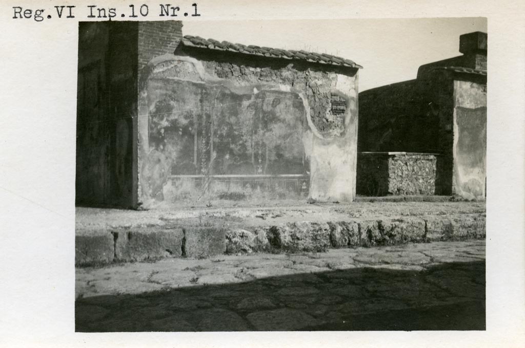 VI.10.2 Pompeii but numbered as VI.10.1 on photo. Pre-1937-39. 
Looking east towards painted plaster on south side of doorway. On the right is VI.10.3
Photo courtesy of American Academy in Rome, Photographic Archive. Warsher collection no. 673.

