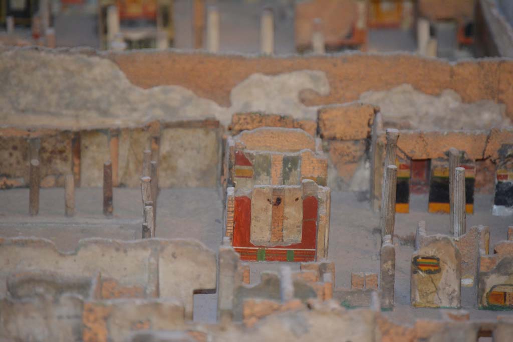 VI.11.9/10 Pompeii. July 2017. Looking east towards red painted east wall of room 35, in centre.
At the rear of this room, the east wall of tablinum 33 can be seen.
From cork model in Naples Archaeological Museum.
Foto Annette Haug, ERC Grant 681269 DCOR.
