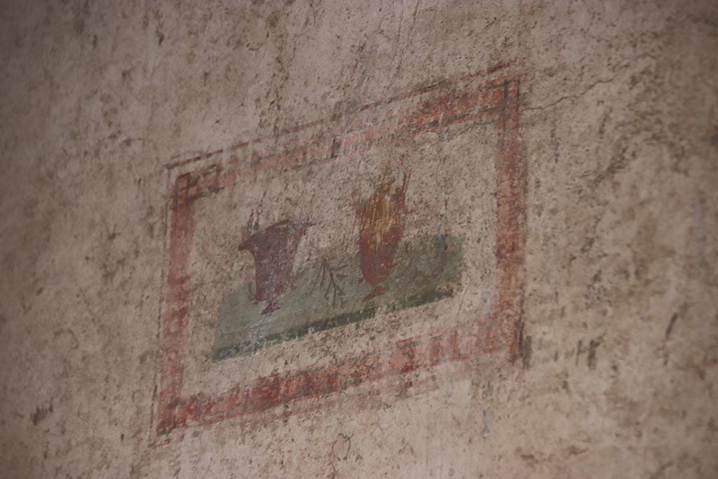 VI.15.1 Pompeii. October 2024. Cubiculum g, painted panel at north end of east wall. Photo courtesy of Klaus Heese.