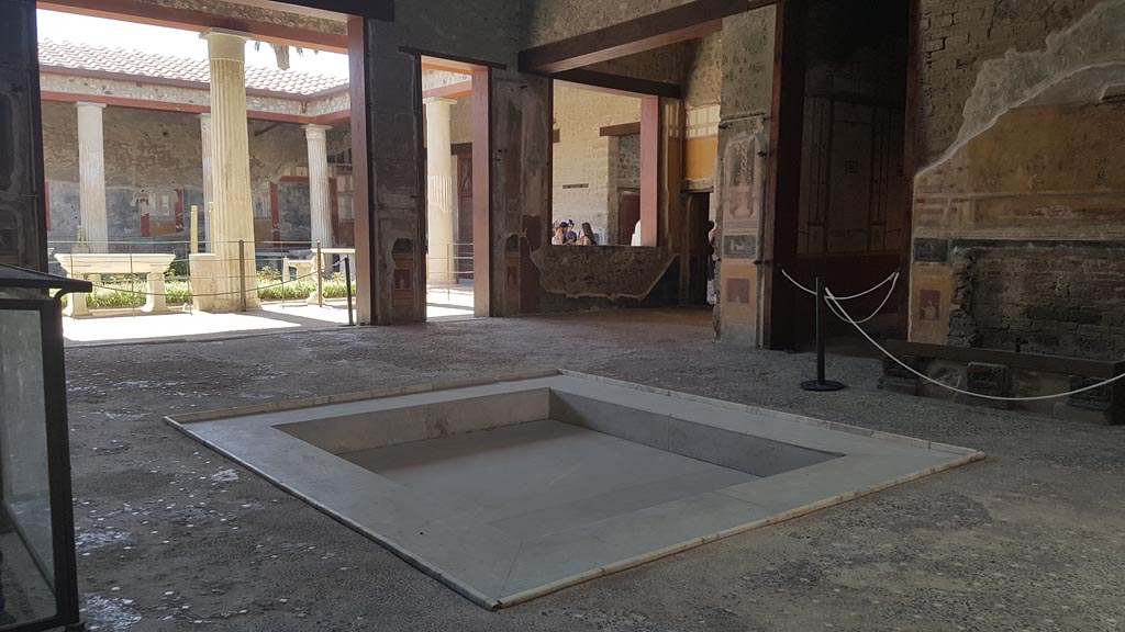 VI.15.1 Pompeii. August 2023. Looking north-west across impluvium in atrium. Photo courtesy of Maribel Velasco.