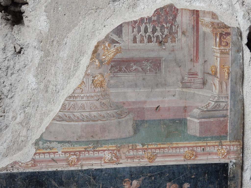 VI.15.1 Pompeii. June 2019.  
Detail of painting in atrium between doorways to bedroom on left of main entrance and oecus on south side. 
Photo courtesy of Buzz Ferebee.
