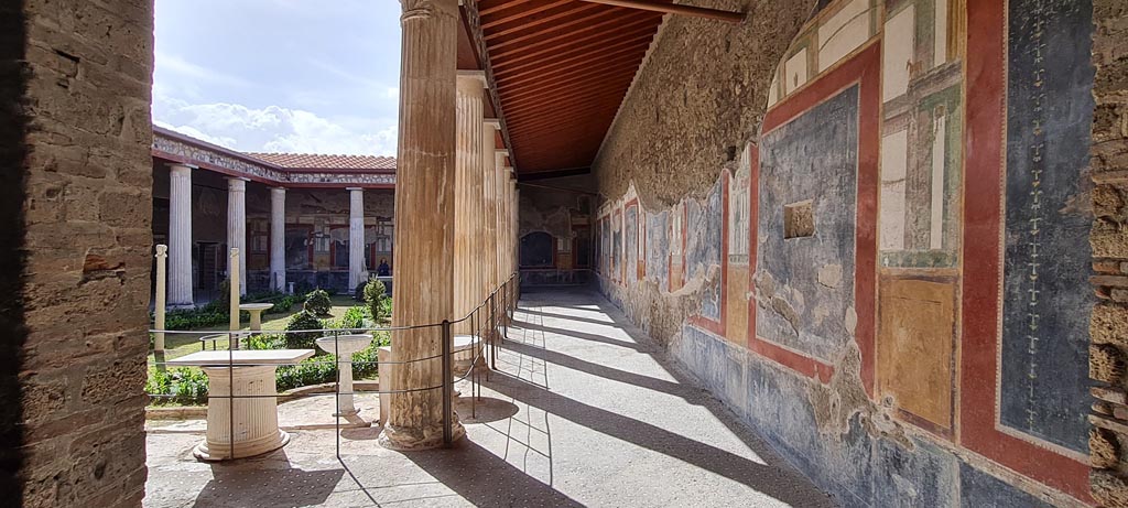 VI.15.1 Pompeii. April 2023. Looking south along west portico from north-west corner. Photo courtesy of Giuseppe Ciaramella.