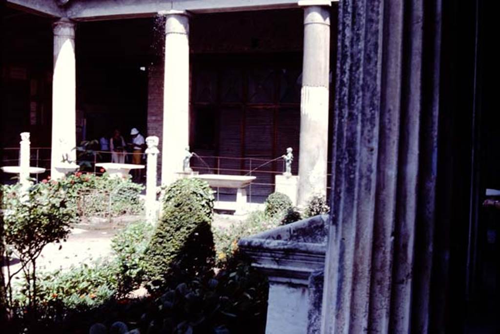 VI.15.1 Pompeii. 1977. Looking towards north side, with working statuette fountains. Photo by Stanley A. Jashemski.   
Source: The Wilhelmina and Stanley A. Jashemski archive in the University of Maryland Library, Special Collections (See collection page) and made available under the Creative Commons Attribution-Non Commercial License v.4. See Licence and use details. J77f0283
