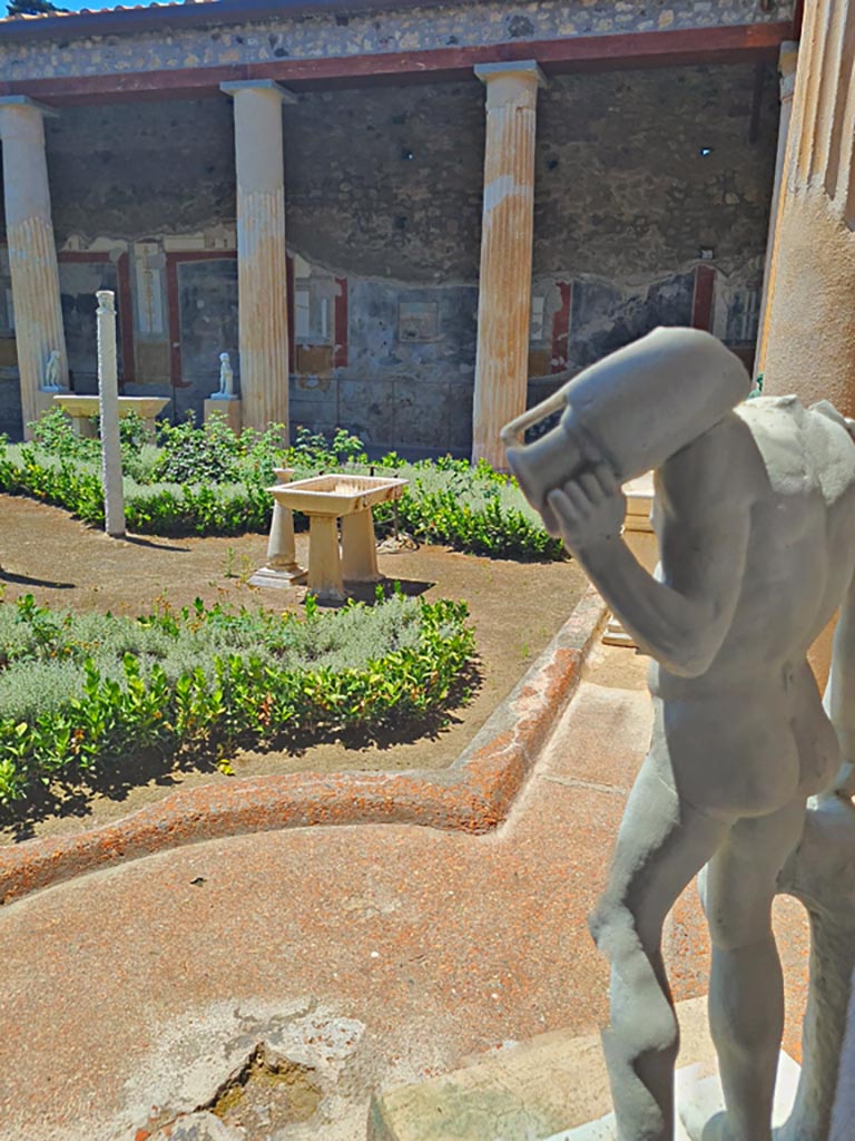 VI.15.1 Pompeii. June 2024. 
Looking towards west portico from north-east corner of peristyle. Photo courtesy of Giuseppe Ciaramella.
