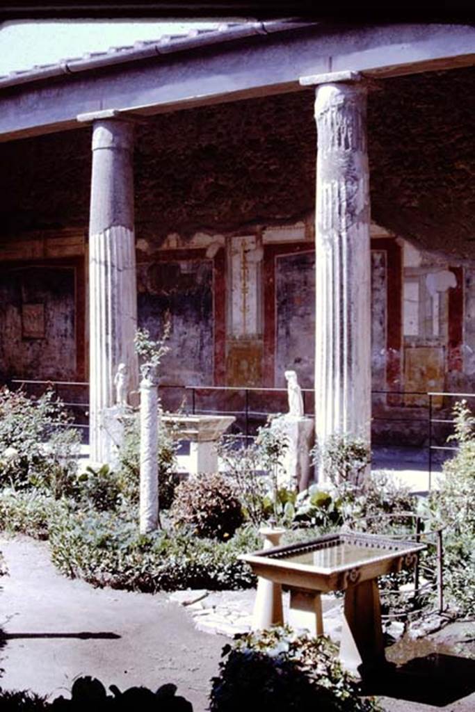 VI.15.1 Pompeii. March 2023. Looking towards south-west corner of peristyle from east portico. Photo courtesy of Johannes Eber.