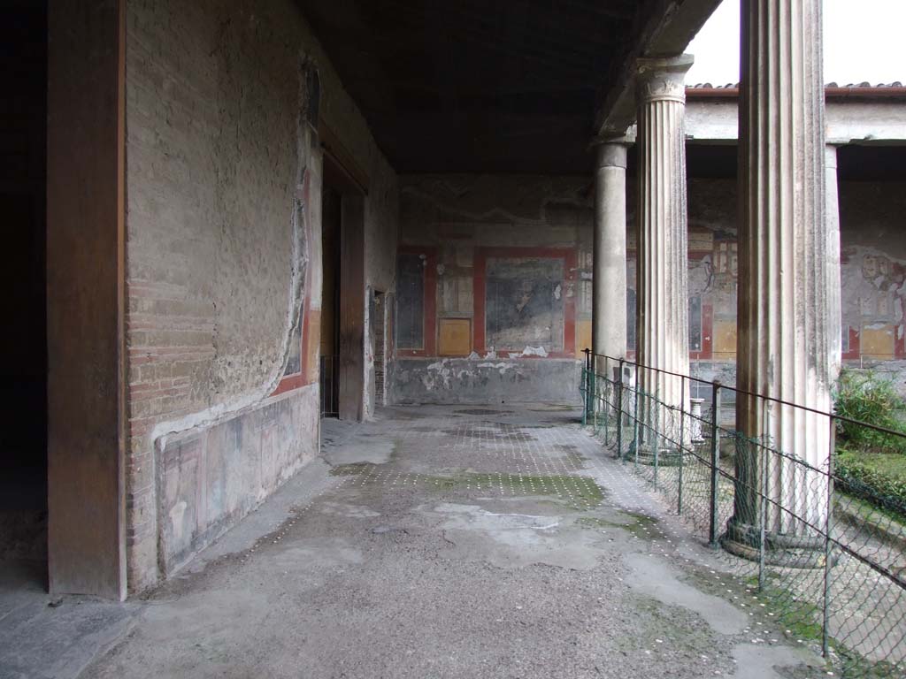 VI.15.1 Pompeii. 1895 photograph by Esposito. Looking east from south side of garden area, during excavations. On the right is the doorway to the Exedra in SE corner, on the left is the atrium still under excavation.  Photo courtesy of Rick Bauer.
