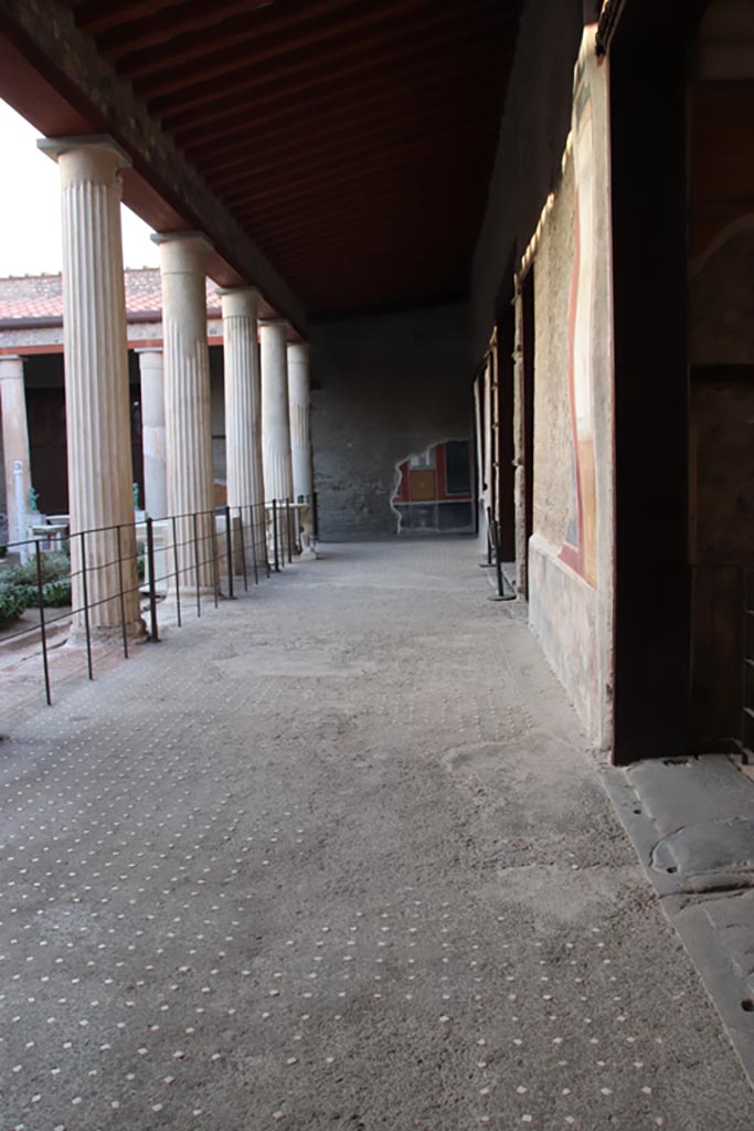 VI.15.1 Pompeii. August 2023. Looking north along gutter on east side of peristyle garden. Photo courtesy of Johannes Eber.