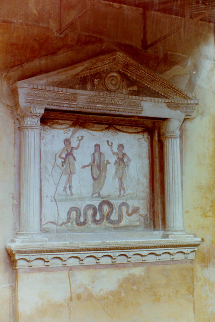 VI.15.1 Pompeii. 4th April 1980, pre-earthquake. 
Household lararium. Photo courtesy of Tina Gilbert.
