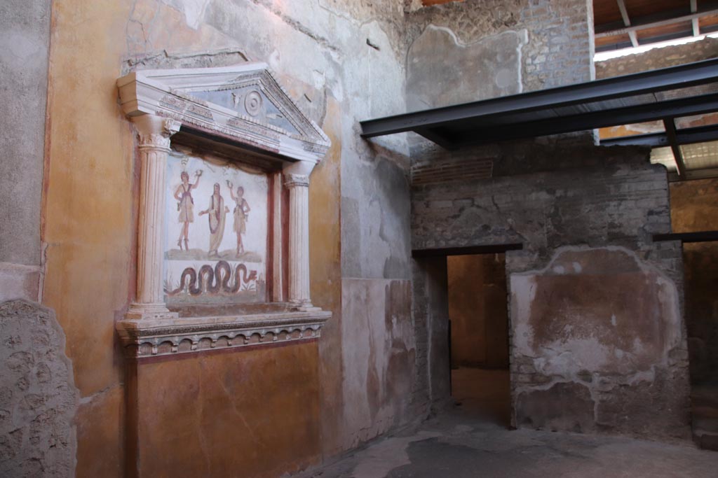 VI.15.1 Pompeii. October 2023. 
Looking towards north side of small atrium, with doorway to kitchen (w), on left, room (x) centre right, and room (z), on right. 
Photo courtesy of Klaus Heese.
