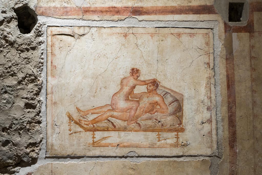 VI.15.1 Pompeii. March 2023. 
North wall, erotic painting in bedroom (x’), used either by servants or as a private brothel? Photo courtesy of Johannes Eber.

