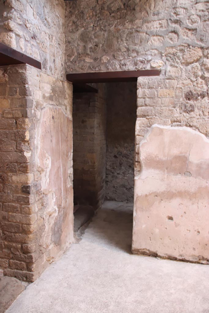 VI.15.1 Pompeii. October 2023. 
Doorway to room (z), looking east from small atrium. Photo courtesy of Klaus Heese.
