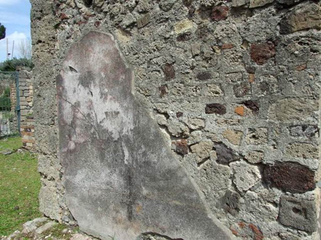 VI.16.27 Pompeii. March 2009. Room L, east wall of tablinum, looking north-east. Nearly all faded was a small landscape that probably would have been seen in the centre of the red panel at the left end of the east wall. The yellow panel in the centre was missing almost entirely, as also the red panel on the right end of this wall. This was mainly missing because of the area used by the doorway into room K. See Notizie degli Scavi, 1908, (p.189)


