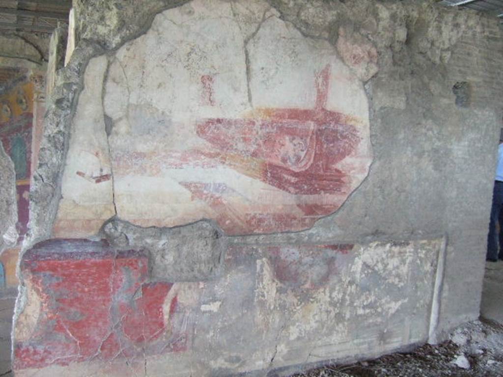 VI.17.41 Pompeii. May 2006. North wall of tablinum with remains of painting of a ship or ships. According to Eleanor Winsor Leach  above a dado supported by telamones stand the prows of two large ships, each resting on its own rectangular pedestal base.
See Winsor Leach, E., 2004.  The Social Life of Painting in Ancient Rome and on the Bay of Naples. Cambridge UK: Cambridge UP. (p.69 onwards)
