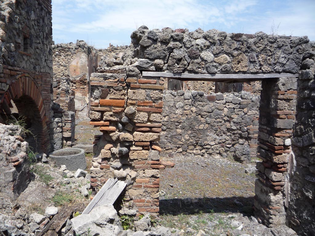 VII.1.36 Pompeii. October 2009. Looking north towards doorway to south-west corner of atrium. Photo courtesy of Jared Benton.