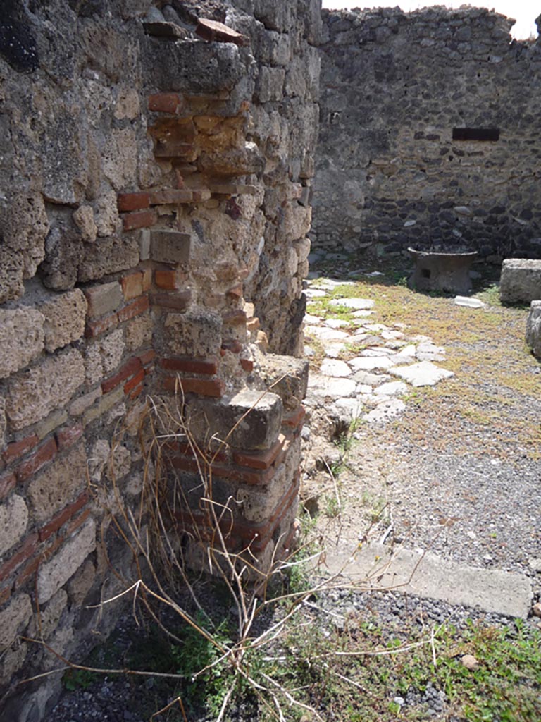 VII.1.36 Pompeii. October 2009. 
Looking south through doorway to milling area from south-east corner of atrium.
Photo courtesy of Jared Benton.
