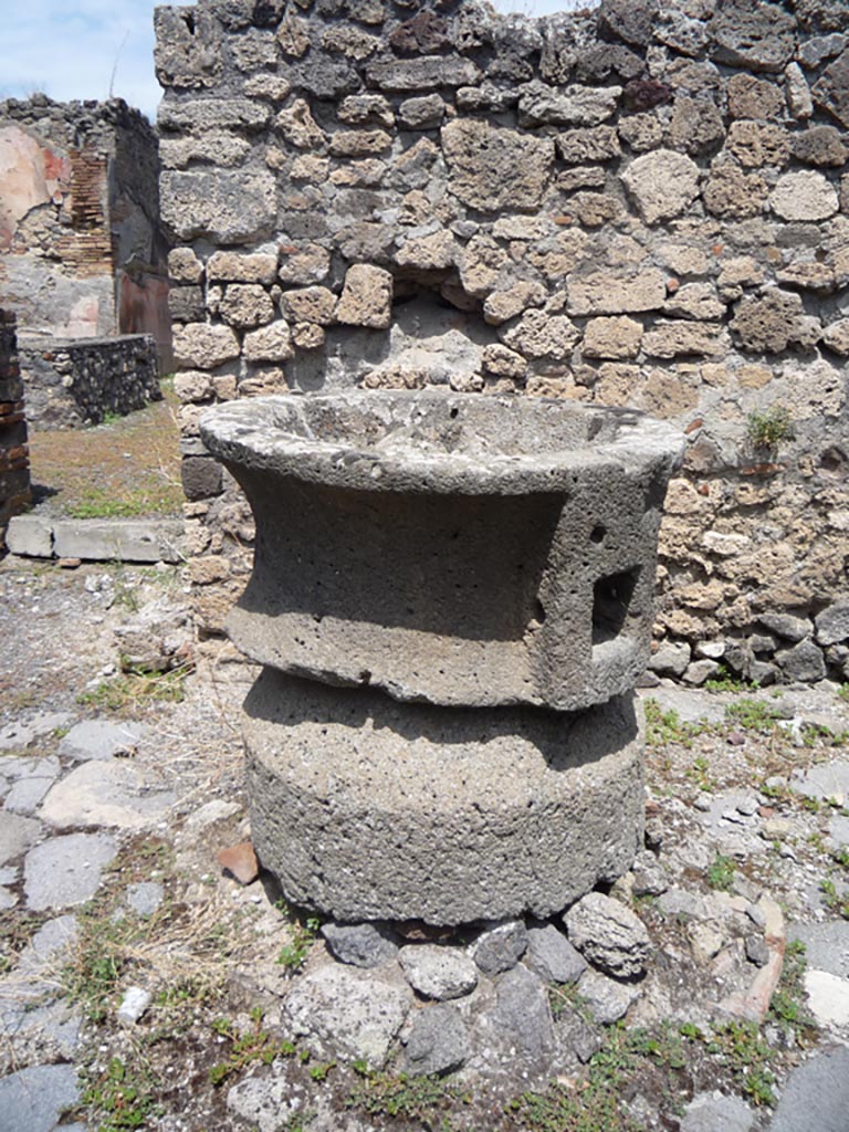 VII.1.36 Pompeii. October 2009. 
Looking north in south-east corner of bakery, with doorway to atrium, on left. Photo courtesy of Jared Benton.
