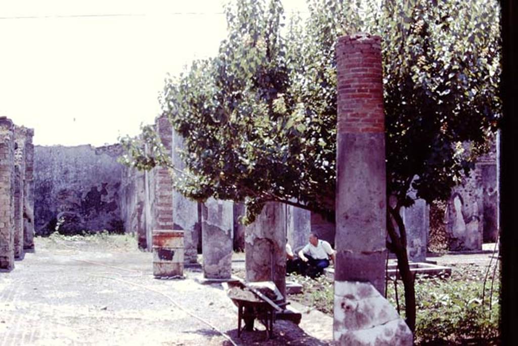 VII.2.16 Pompeii. 1978. Looking south along east side of peristyle towards room 15, on left. 
Photo by Stanley A. Jashemski.   
Source: The Wilhelmina and Stanley A. Jashemski archive in the University of Maryland Library, Special Collections (See collection page) and made available under the Creative Commons Attribution-Non Commercial License v.4. See Licence and use details.
J78f0212

