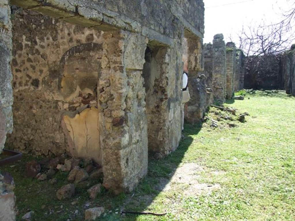 VII.2.16 Pompeii.  March 2009.  Looking south along East Portico of Peristyle Garden.