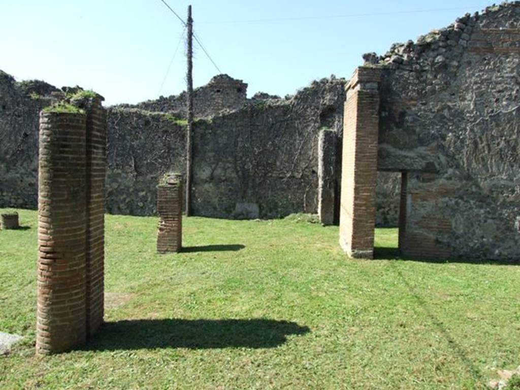 VII.2.18 Pompeii. March 2009. Looking west along north portico of peristyle garden.