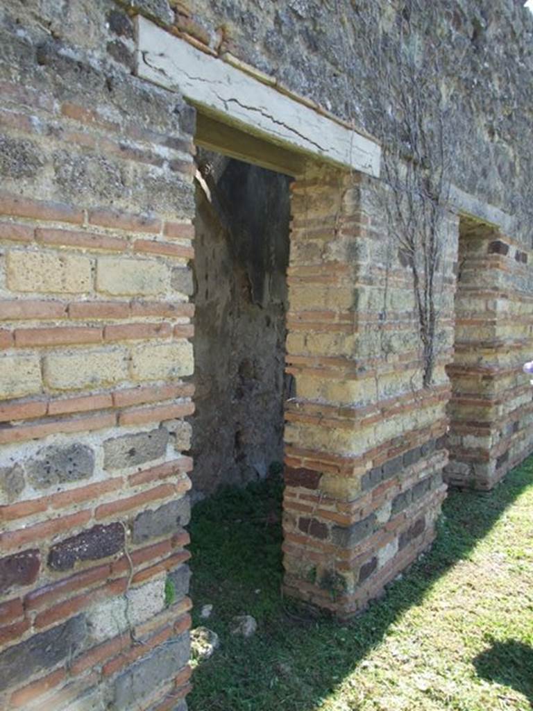 VII.2.18 Pompeii. March 2009. Doorway to room 12, cupboard or small room.