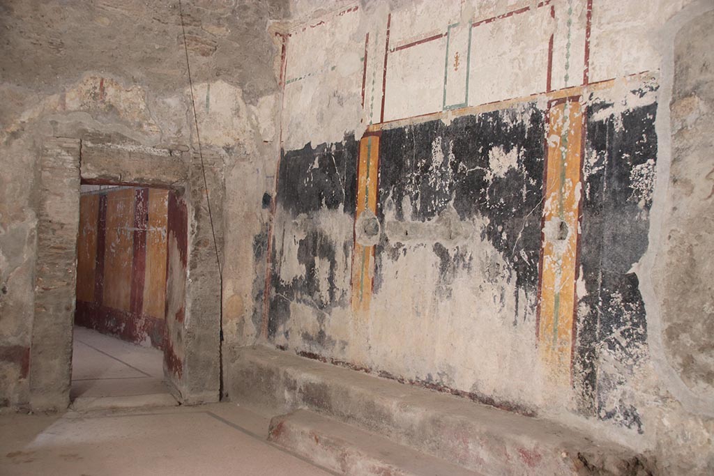 VII.5.8 Pompeii. October 2024. 
Changing room (46), south-west corner with doorway into room 49, Tepidarium. Photo courtesy of Klaus Heese.
