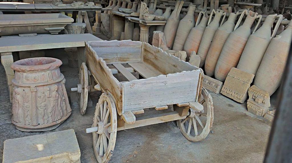 VII.7.29 Pompeii. 2016/2017. Items in storage, and cart, looking north-west. Photo courtesy of Giuseppe Ciaramella.