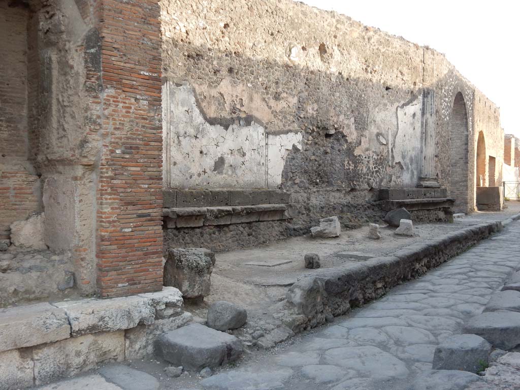 VII.8 Pompeii Forum. June 2019. Looking south from arch, (on left) towards north wall of Forum in Vicolo dei Soprastanti.
Photo courtesy of Buzz Ferebee.

